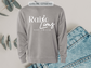 Raise Lions Not Sheep Crewneck